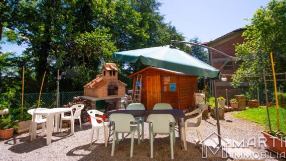 Ultimo Piano di Villetta con Giardino e Garage