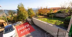 Appartamento con Giardino Privato e Posto Auto