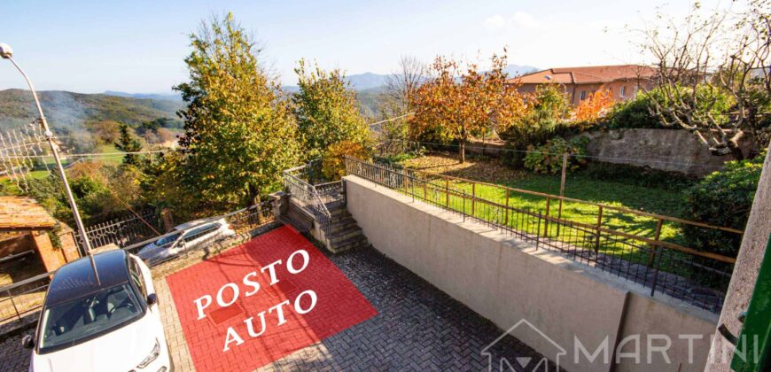 Appartamento con Giardino Privato e Posto Auto